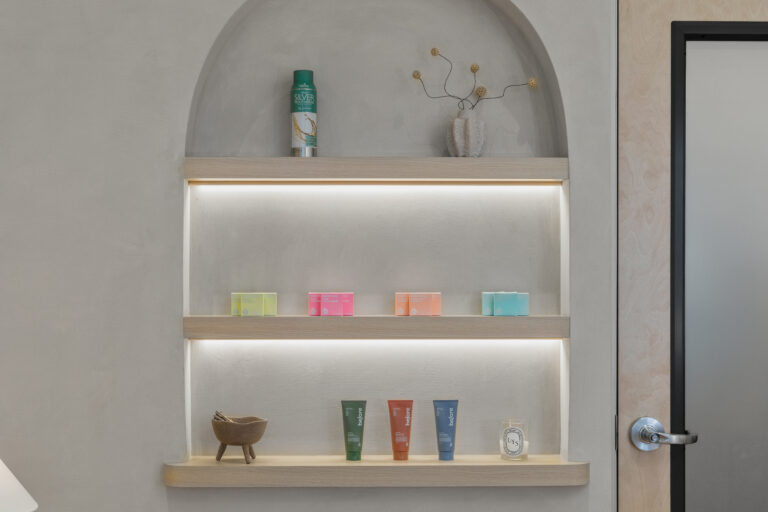 Minimalist shelf with colorful products