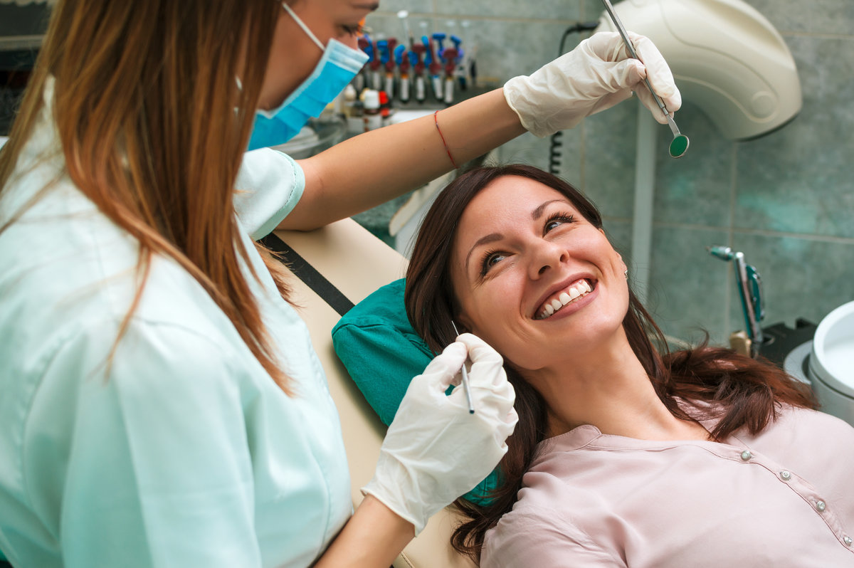 Beautiful woman smiling at the dentist's